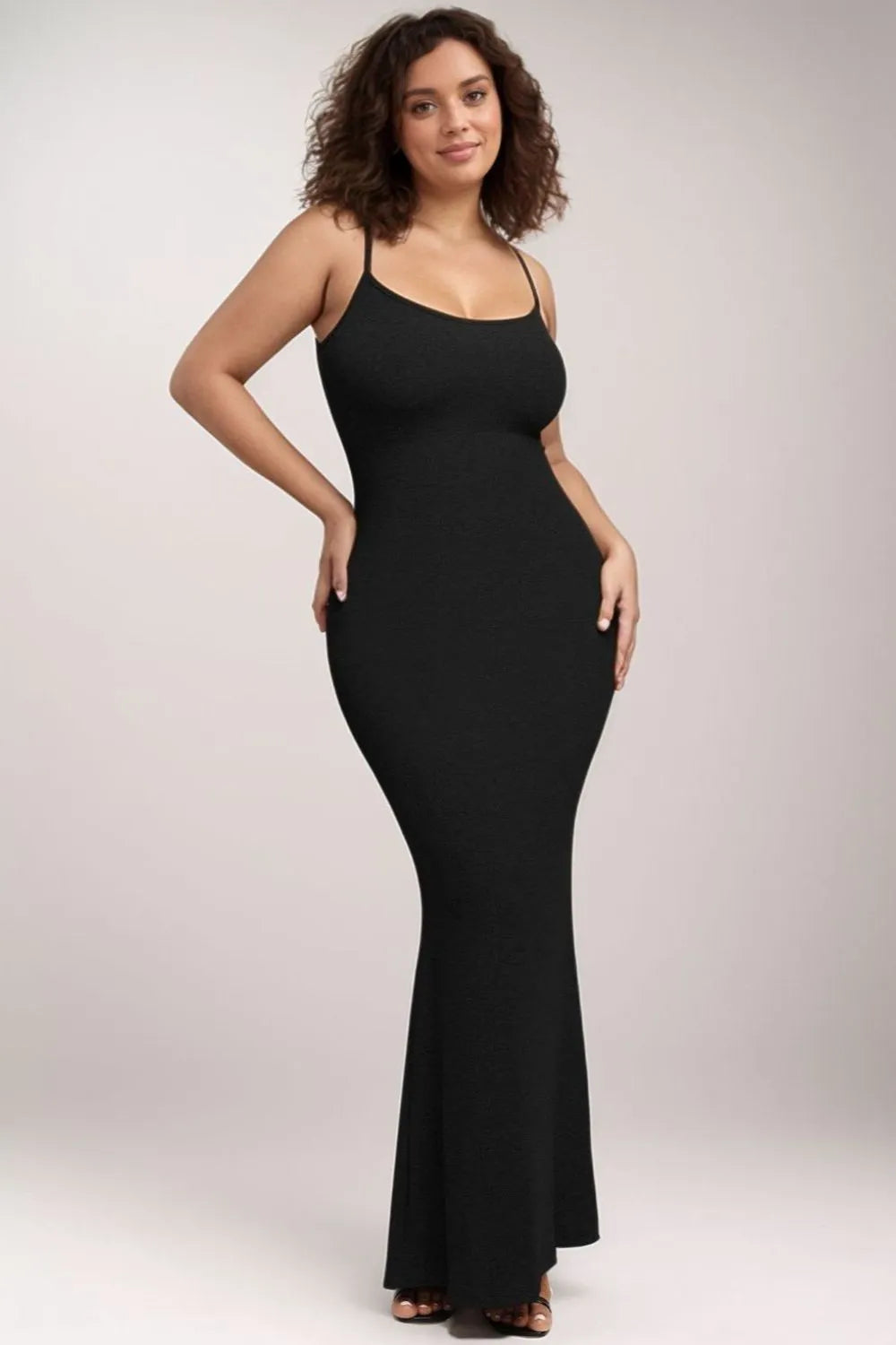 Model wearing a black shapewear dress from Mimi Bella